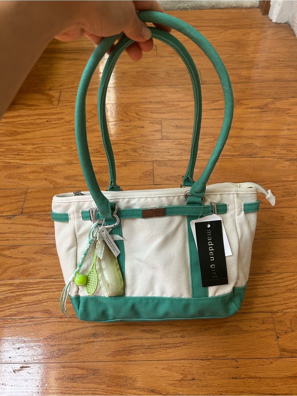 madden girl Canvas Tote with matching charms size 11x5x9” handle 11”